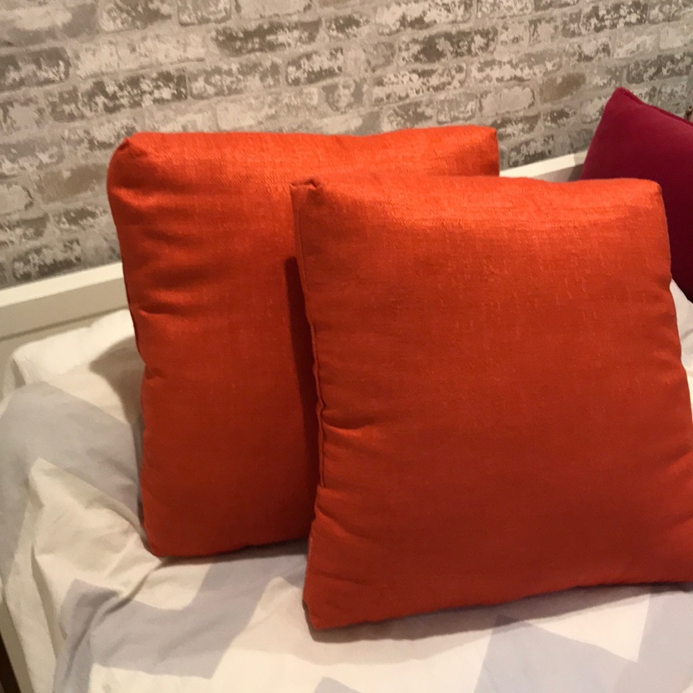 Two Square Orange Pillows
